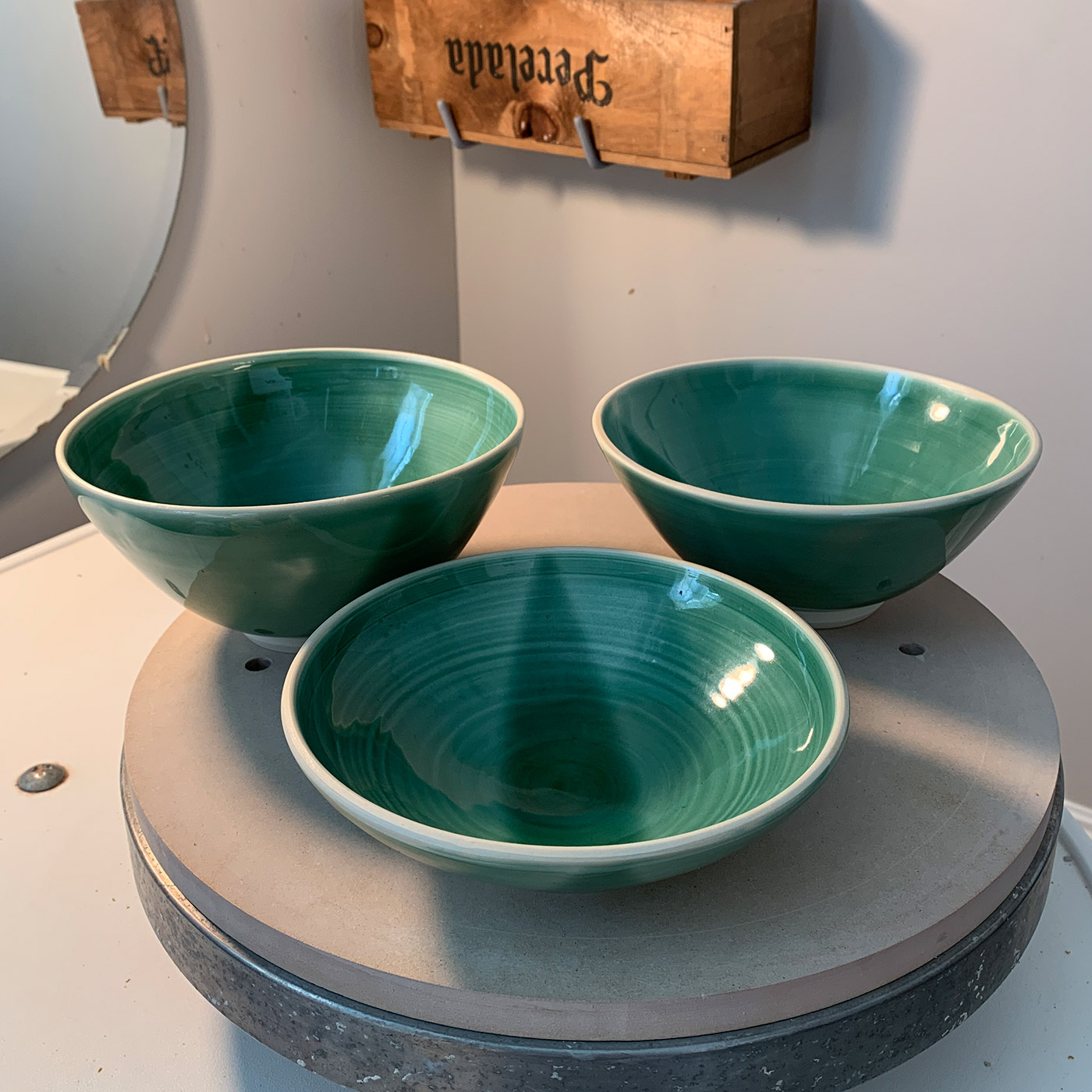 Three green bowls
