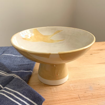 Plat de service avec oiseaux